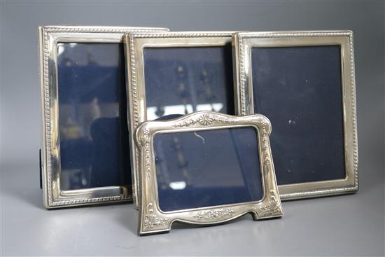 A pair of modern silver mounted photograph frames, Sheffield, 1991 and two other silver frames, largest 22cm.